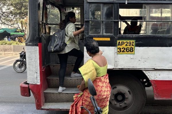 Indian women boarding free bus