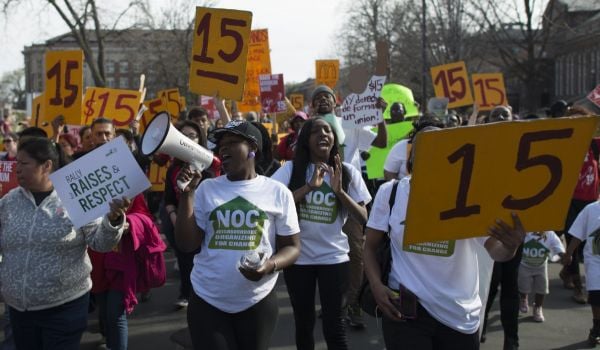 Protestors rally for a $15 minimum wage in Minneapolis on April 15, 2015, as part of a nationwide action to demand a $15 minimum wage. Two years later, Minneapolis voted to raise the minimum wage to $15.