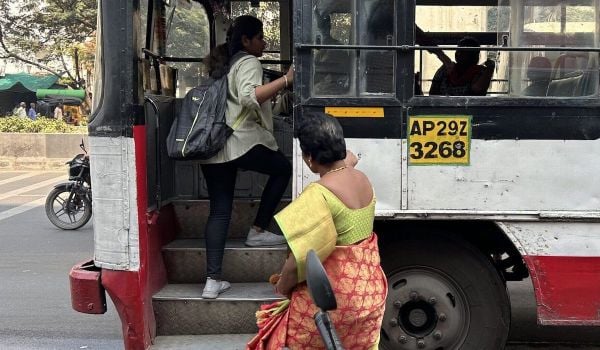 Indian women boarding free bus