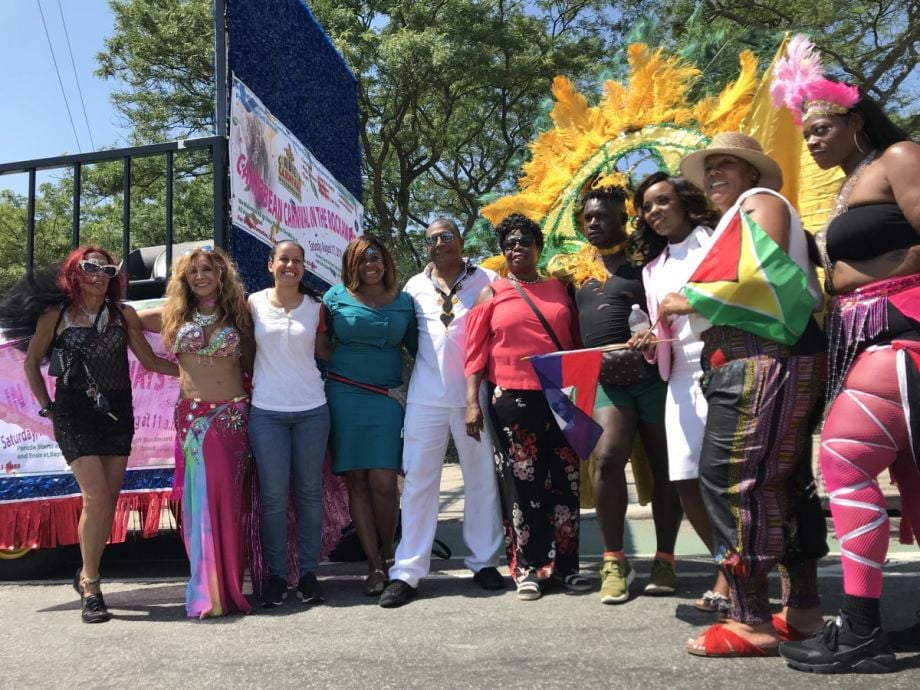New York State Sen. James Sanders Jr. (center, in all white) at Carnival in the Rockaways in August 2019.