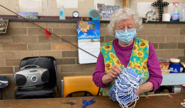 Mildred Crowder, of Quinter Textiles, assembles face masks as part of the Carolina Textile District's contract to produce PPE for health-care workers in the region and beyond.