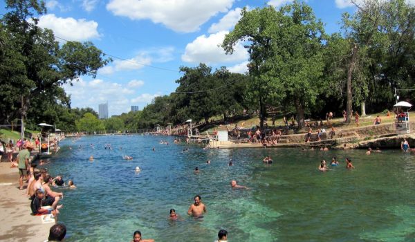 Swimming in Barton Springs Pool in Austin, Texas.