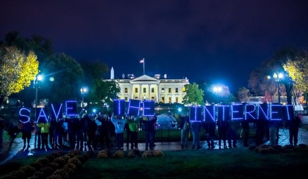 Demonstrators rally for Net Neutrality in front of the White House in Washington, DC in 2014.