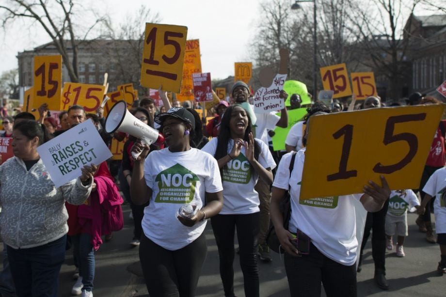 Protestors rally for a $15 minimum wage in Minneapolis on April 15, 2015, as part of a nationwide action to demand a $15 minimum wage. Two years later, Minneapolis voted to raise the minimum wage to $15.