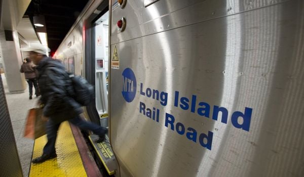 Person exiting a Long Island Railroad commuter train