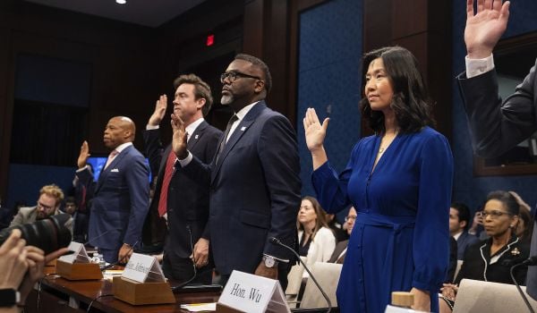 New York City Mayor Eric Adams, Denver Mayor Mike Johnston, Chicago Mayor Brandon Johnson, and Boston Mayor Michelle Wu are sworn in to testify during a hearing on sanctuary cities on Capitol Hill.