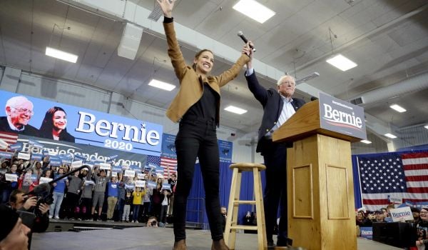Democratic presidential candidate Sen. Bernie Sanders, I-Vt., and Rep. Alexandria Ocasio-Cortez, D-N.Y., greet supporters on the campus of Iowa Western Community College in Council Bluffs, Iowa, Friday, Nov. 8, 2019.