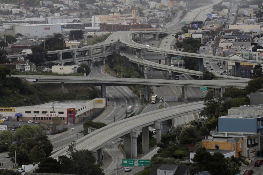 Light traffic drives on Interstate 280, Highway 101 and city streets in San Francisco, Tuesday, March 24, 2020. 