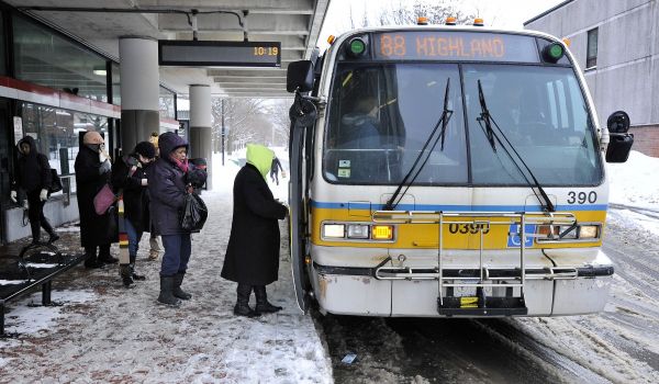 Photo of an MBTA bus in a snowstorm