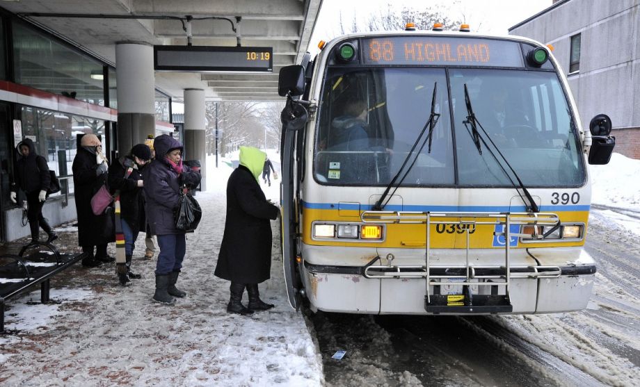 Photo of an MBTA bus in a snowstorm