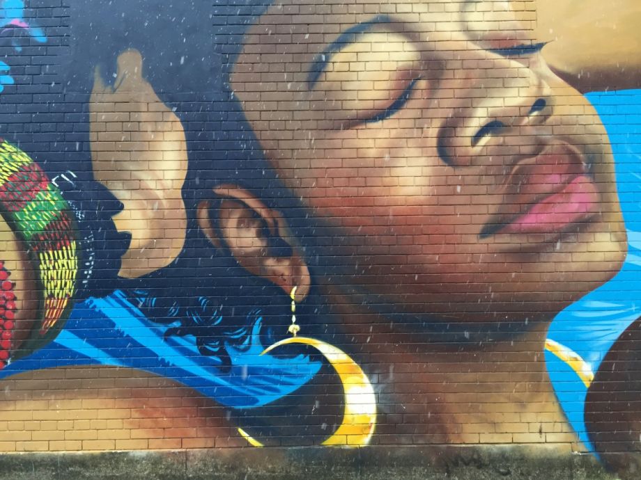 Mural in the Bronx showing a woman's face