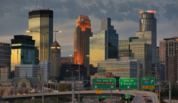 A view of downtown Minneapolis overlooking a highway.