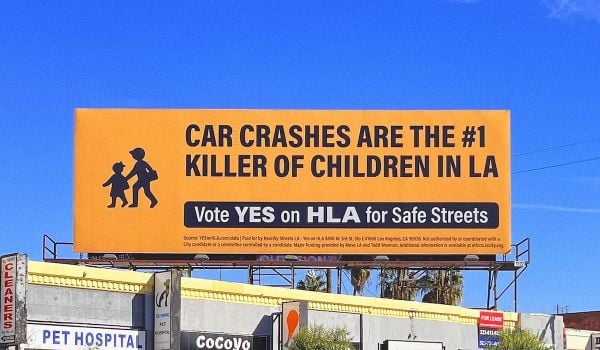A billboard advocating for the Healthy Streets LA ballot measure.