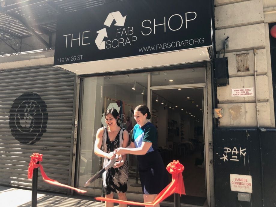 Camille Tagle (left) and Jessica Schreiber (right) cut the ribbon on the new Fabscrap shop, which aims to put a larger dent in New York's textile waste. 
