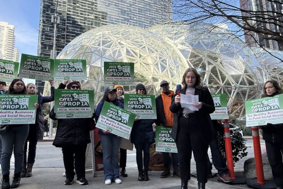 Social housing advocates rally outside Seattle's Amazon Spheres after the company dumped $100,000 into the opposition campaign. (Photo courtesy House Our Neighbors)
