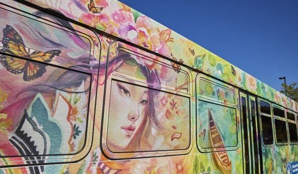 A bus wrap designed by an artist-in-residence.