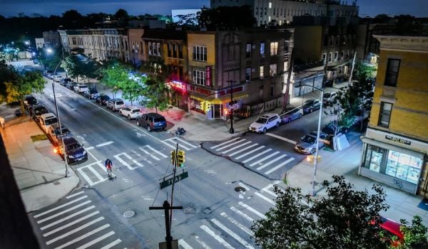 Aerial view of an intersection in a New York City neighborhood