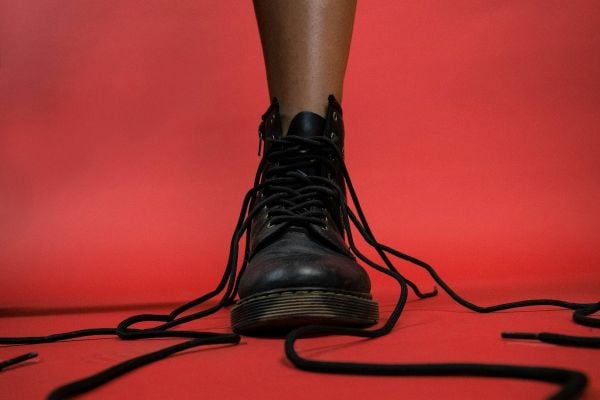 A leg wearing a boot.