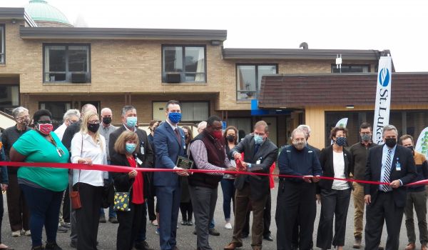 Ribbon cutting at the St. Francis Apartments in Duluth, which will offer over 40 units and supportive services.