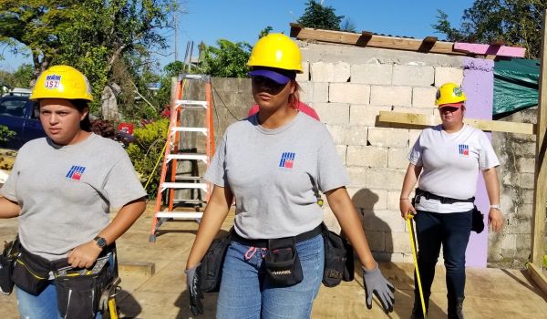 From left: Ana D Burgos Colón, Ashley M Pérez, and Ana H Burgos Colón, women trained and apprenticed by HEART 9/11 to rebuild roofs in Puerto Rico.