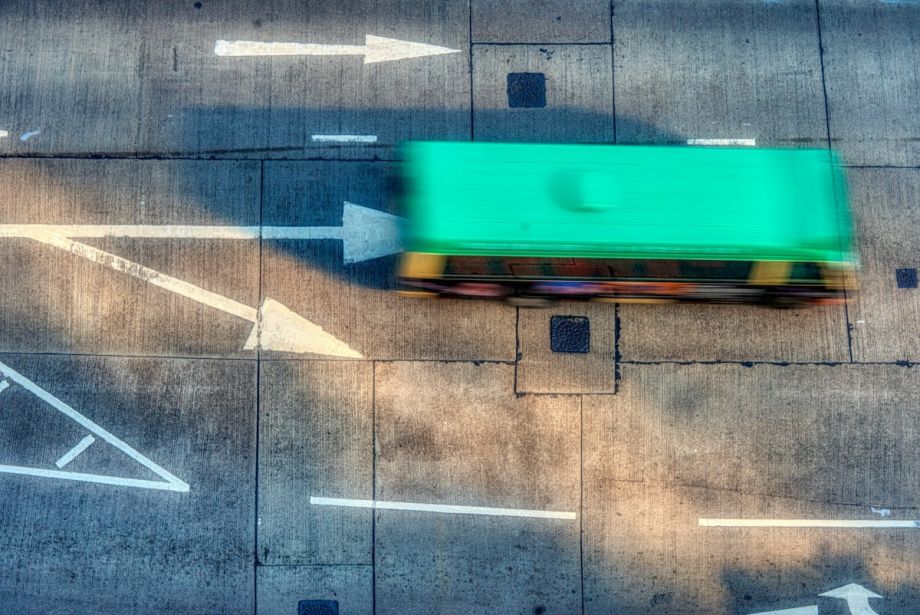 A bus driving along a road.